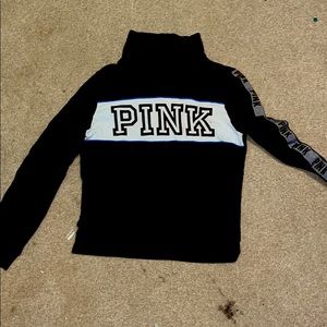 Pink turtleneck sweatshirt